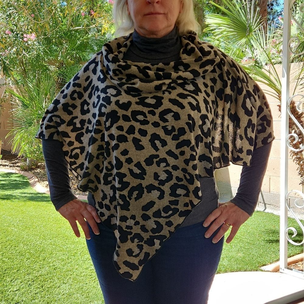 Poncho style animal print tunic/shawl by Laura's Boutique. One size fits all.